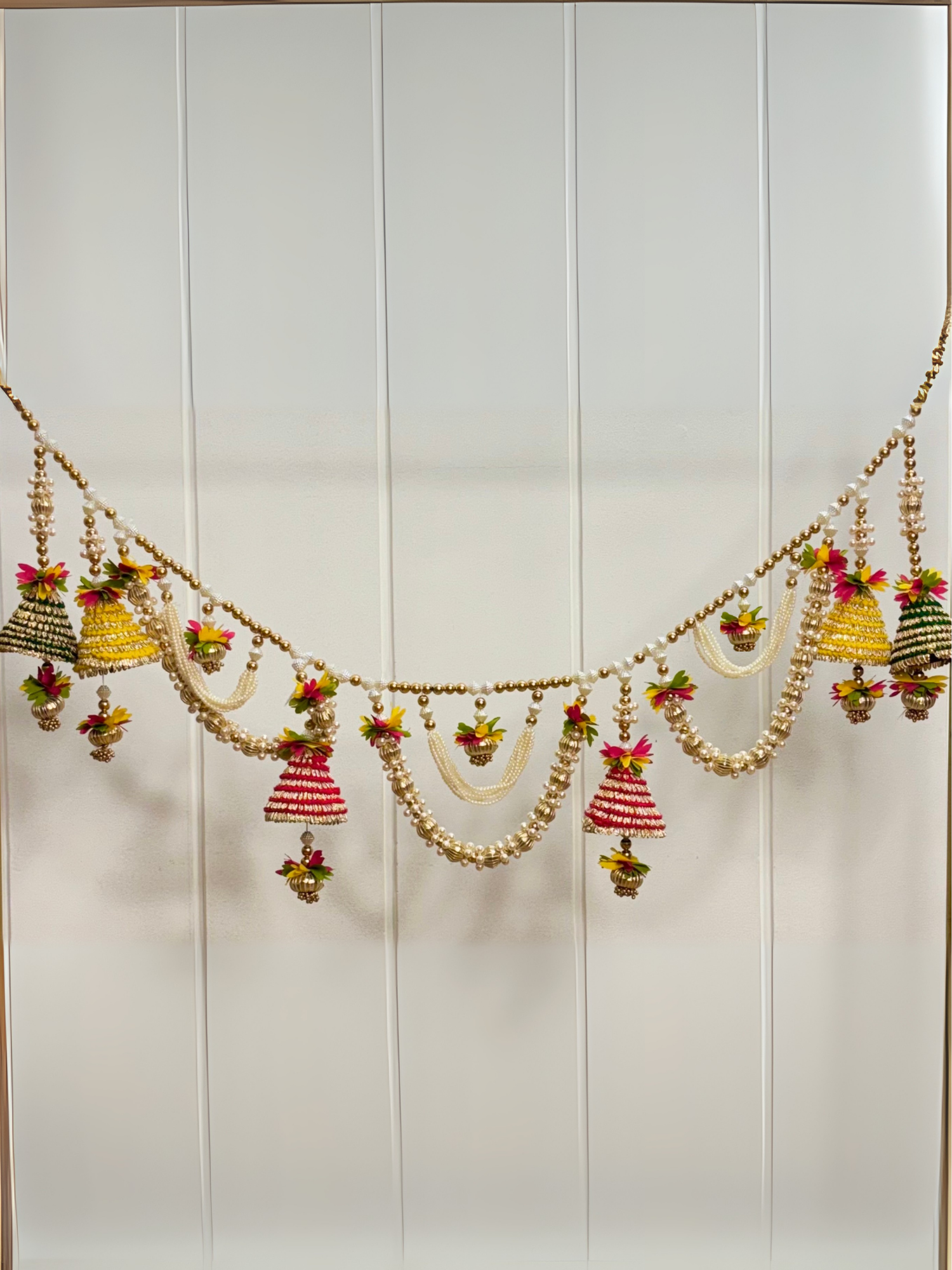 Decorative garland with small bells and flowers